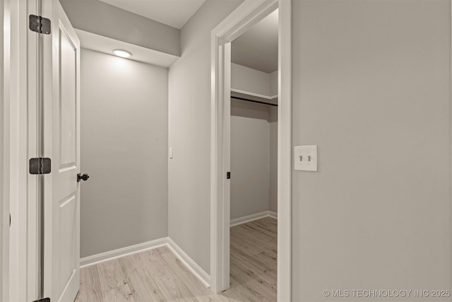 9421 S 69th E Ave, Tulsa, OK 74133 - hall featuring light wood-style flooring and baseboards