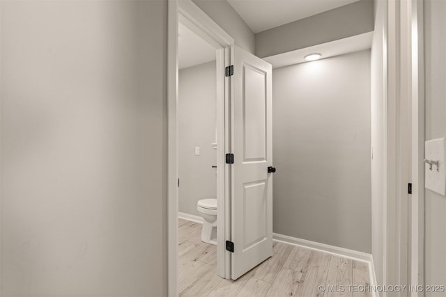 9421 S 69th E Ave, Tulsa, OK 74133 - hall with light wood finished floors and baseboards