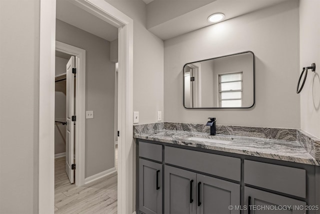 9421 S 69th E Ave, Tulsa, OK 74133 - bathroom featuring vanity and wood finished floors