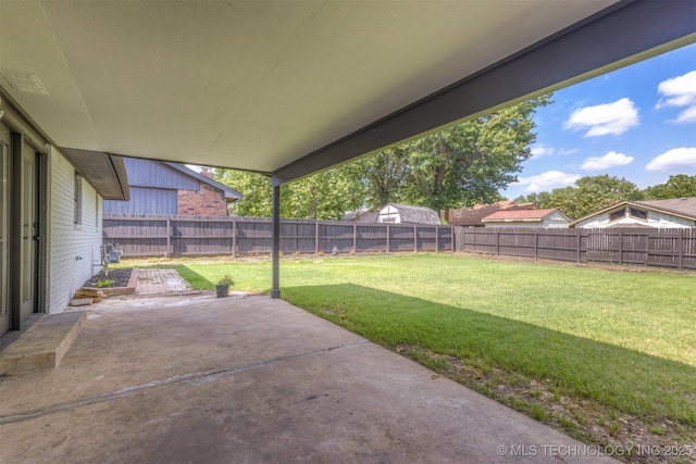 9421 S 69th E Ave, Tulsa, OK 74133 - fenced backyard featuring a patio
