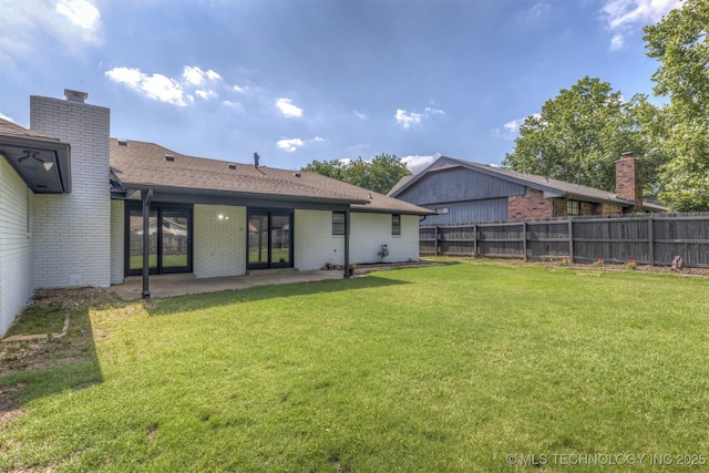 9421 S 69th E Ave, Tulsa, OK 74133 - view of yard featuring a patio area