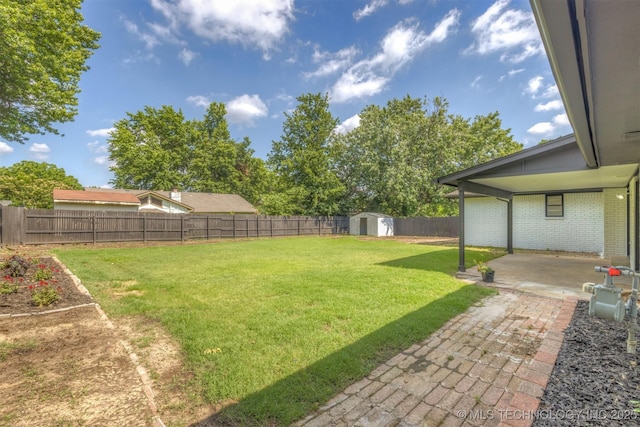 9421 S 69th E Ave, Tulsa, OK 74133 - fenced backyard with a patio area and a shed