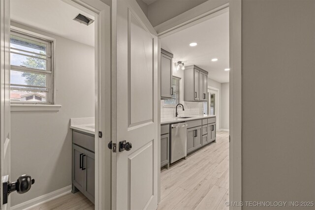 9421 S 69th E Ave, Tulsa, OK 74133 - corridor with light wood-style flooring and recessed lighting