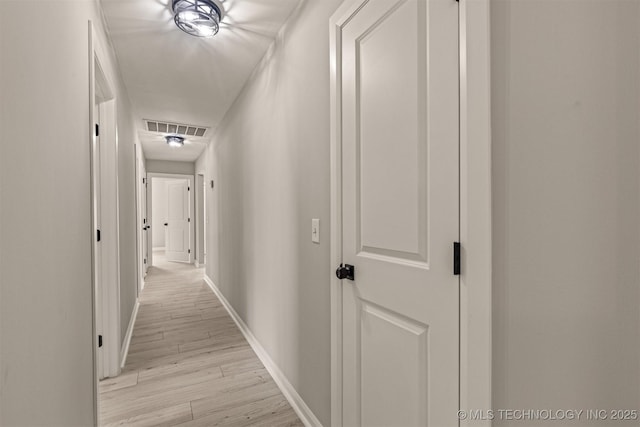 9421 S 69th E Ave, Tulsa, OK 74133 - corridor with light wood finished floors and baseboards