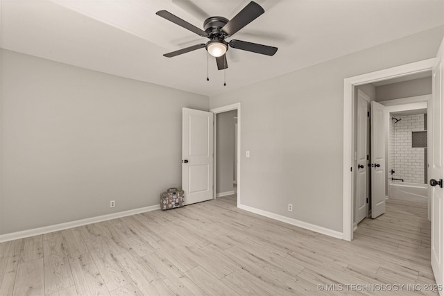 9421 S 69th E Ave, Tulsa, OK 74133 - unfurnished bedroom featuring light wood-type flooring and a ceiling fan