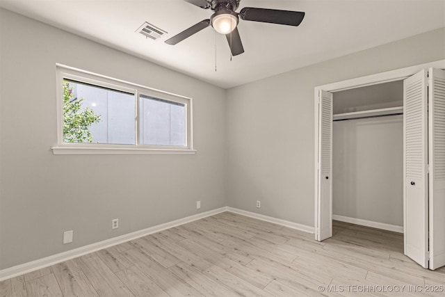 9421 S 69th E Ave, Tulsa, OK 74133 - unfurnished bedroom with light wood-style floors, a closet, and ceiling fan