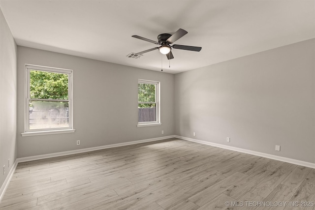 9421 S 69th E Ave, Tulsa, OK 74133 - unfurnished room with light wood finished floors and ceiling fan