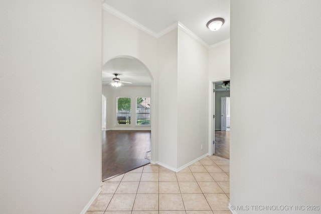 2109 W Maple St, Collinsville, OK 74021 - hall featuring arched walkways, ornamental molding, and light tile patterned floors