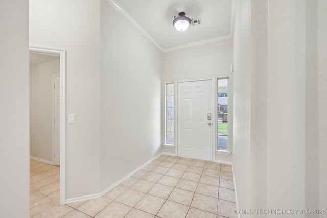 2109 W Maple St, Collinsville, OK 74021 - foyer featuring light tile patterned floors and crown molding