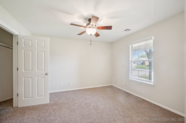 2109 W Maple St, Collinsville, OK 74021 - unfurnished bedroom with carpet floors, a closet, and ceiling fan