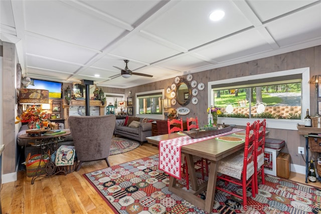 453805 E 315th Rd, Afton, OK 74331 - dining space featuring coffered ceiling, wood walls, wood finished floors, and a ceiling fan