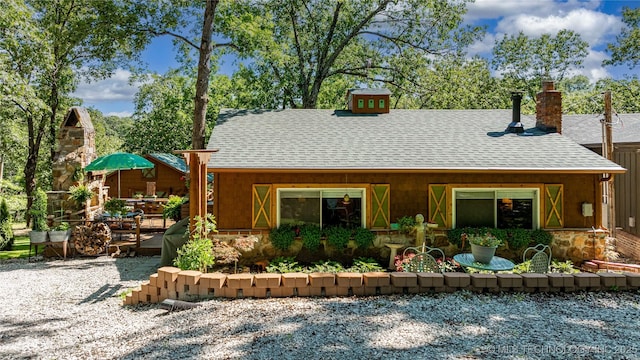 453805 E 315th Rd, Afton, OK 74331 - rear view of property featuring a shingled roof and a chimney