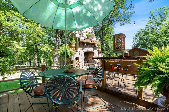 453805 E 315th Rd, Afton, OK 74331 - deck featuring an outdoor stone fireplace