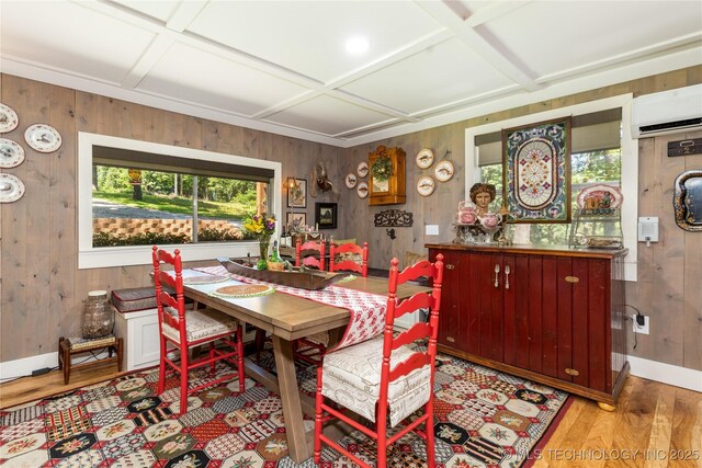 453805 E 315th Rd, Afton, OK 74331 - dining room featuring light wood-style floors, wood walls, a wall unit AC, and coffered ceiling