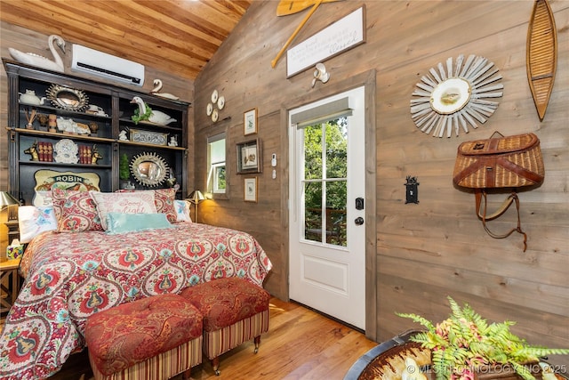 453805 E 315th Rd, Afton, OK 74331 - bedroom featuring vaulted ceiling, a wall unit AC, wood walls, wooden ceiling, and wood finished floors