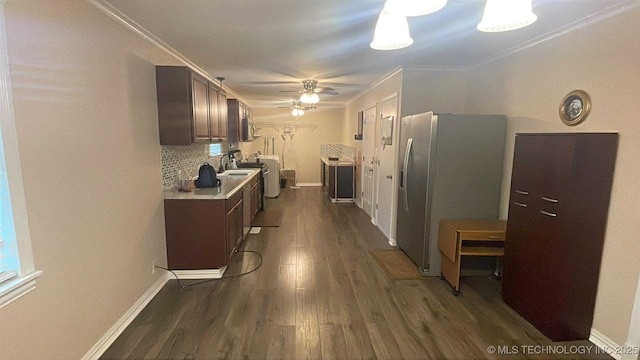 219 N Anthony St, Muskogee, OK 74403 - kitchen with stainless steel fridge with ice dispenser, dark wood-style flooring, a ceiling fan, light countertops, and backsplash