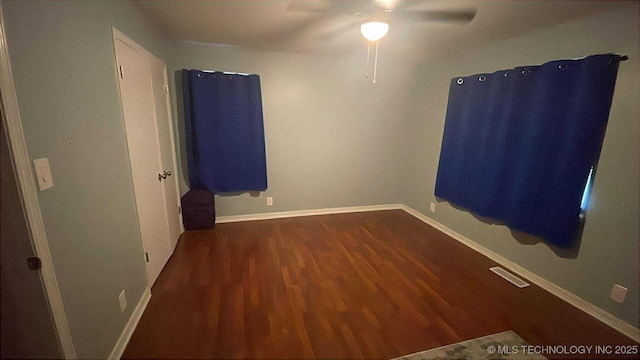 219 N Anthony St, Muskogee, OK 74403 - unfurnished bedroom featuring wood finished floors and ceiling fan