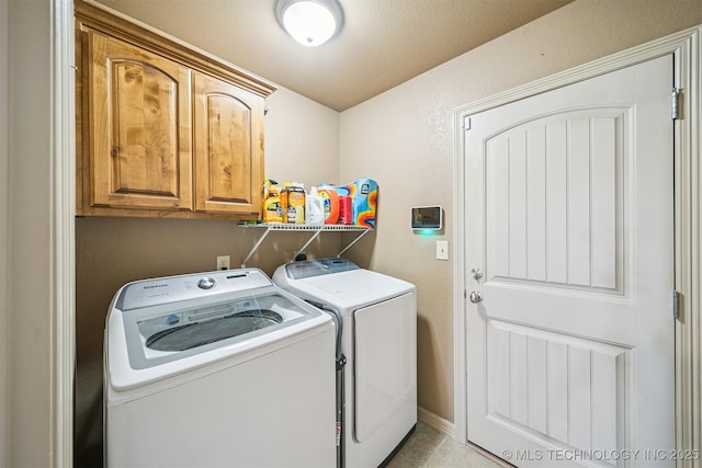 13037 N 124th E Pl, Collinsville, OK 74021 - laundry area with washer and dryer, cabinet space, and light tile patterned floors