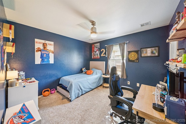 13037 N 124th E Pl, Collinsville, OK 74021 - carpeted bedroom with a desk, a ceiling fan, and a textured wall