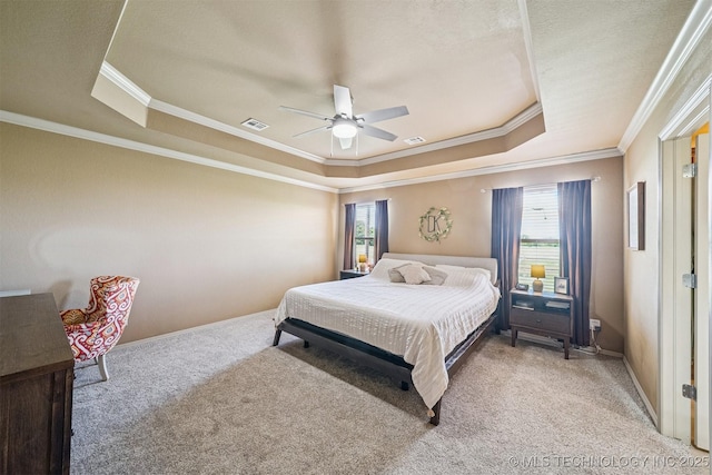 13037 N 124th E Pl, Collinsville, OK 74021 - bedroom with a tray ceiling, light colored carpet, crown molding, and ceiling fan
