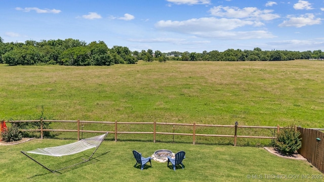13037 N 124th E Pl, Collinsville, OK 74021 - view of yard with a fire pit and a view of countryside