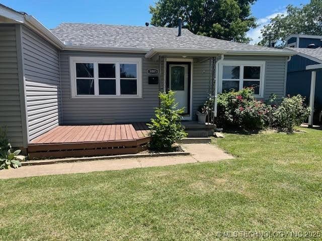 5003 S Boston Ave, Tulsa, OK 74105 - view of exterior entry with a lawn