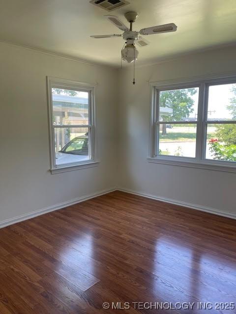 5003 S Boston Ave, Tulsa, OK 74105 - spare room with wood finished floors and ceiling fan