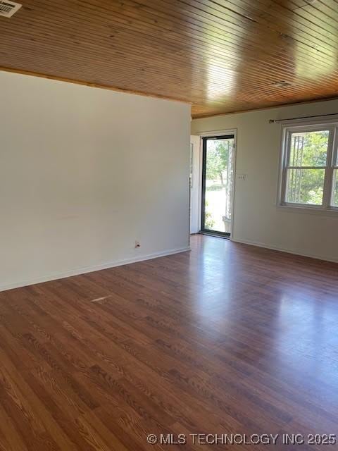 5003 S Boston Ave, Tulsa, OK 74105 - spare room featuring wood ceiling and dark wood-style flooring