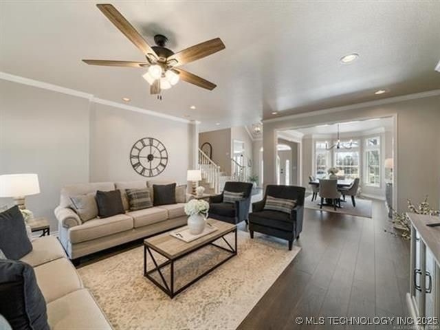 408 W Fairway Ct, Broken Arrow, OK 74011 - living area with stairway, recessed lighting, dark wood-type flooring, ornamental molding, and a ceiling fan