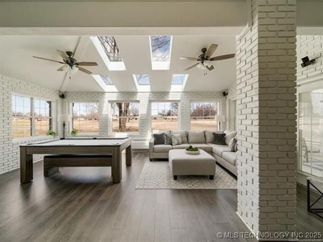 408 W Fairway Ct, Broken Arrow, OK 74011 - rec room with dark wood finished floors, brick wall, billiards table, a skylight, and a ceiling fan