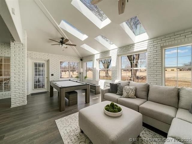408 W Fairway Ct, Broken Arrow, OK 74011 - playroom with dark wood-style flooring, vaulted ceiling, billiards, ceiling fan, and a skylight