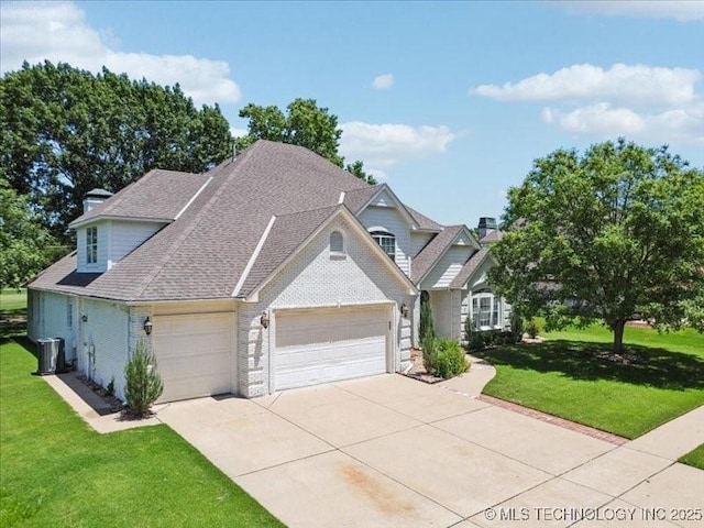 408 W Fairway Ct, Broken Arrow, OK 74011 - view of front of house featuring a garage, concrete driveway, a front yard, and brick siding