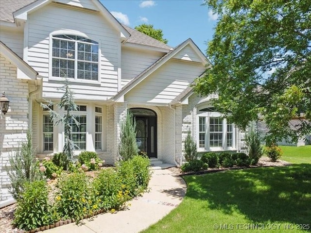 408 W Fairway Ct, Broken Arrow, OK 74011 - view of front of house featuring brick siding and a front yard