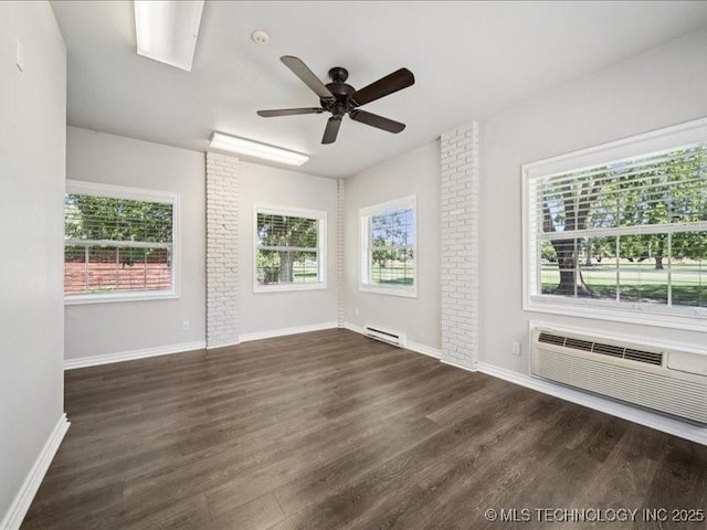 408 W Fairway Ct, Broken Arrow, OK 74011 - unfurnished room with dark wood-type flooring, ceiling fan, a wall mounted AC, and baseboard heating