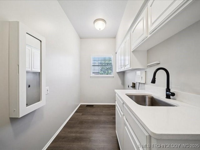408 W Fairway Ct, Broken Arrow, OK 74011 - washroom featuring cabinet space, dark wood finished floors, and hookup for a washing machine