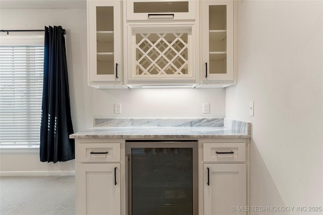 5913 E 127th St S, Tulsa, OK 74008 - indoor dry bar featuring beverage cooler and carpet floors