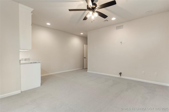 5913 E 127th St S, Tulsa, OK 74008 - spare room featuring ceiling fan, recessed lighting, and light carpet