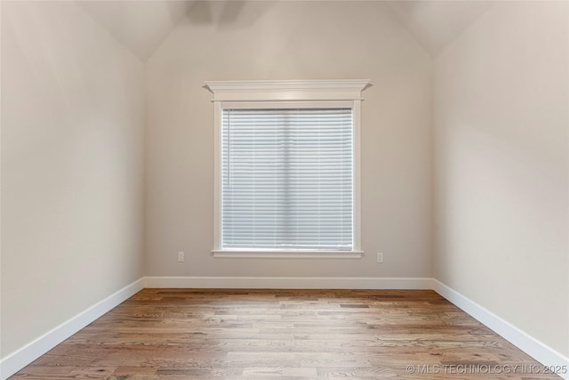 5913 E 127th St S, Tulsa, OK 74008 - unfurnished room with lofted ceiling, light wood-type flooring, and plenty of natural light