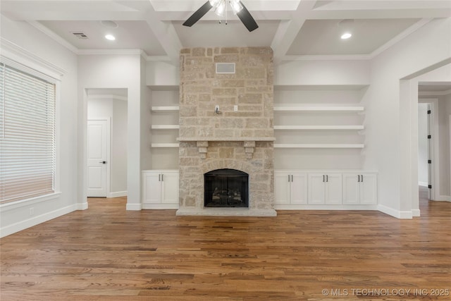 5913 E 127th St S, Tulsa, OK 74008 - unfurnished living room featuring ceiling fan, wood finished floors, a fireplace, ornamental molding, and built in shelves