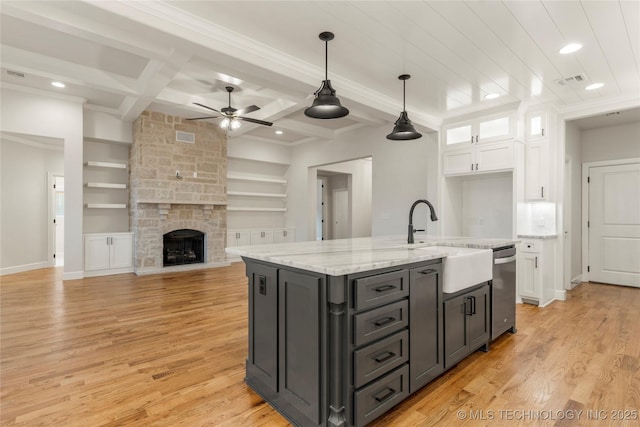 5913 E 127th St S, Tulsa, OK 74008 - kitchen with white cabinets, a ceiling fan, light wood finished floors, recessed lighting, and beam ceiling
