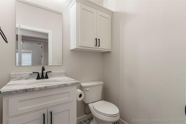 5913 E 127th St S, Tulsa, OK 74008 - bathroom with toilet and vanity