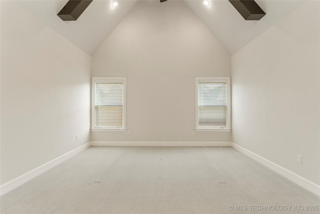 5913 E 127th St S, Tulsa, OK 74008 - empty room with high vaulted ceiling, light carpet, and recessed lighting