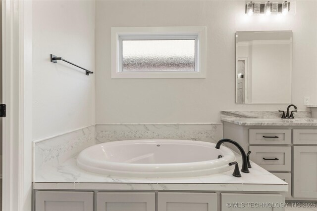 5913 E 127th St S, Tulsa, OK 74008 - full bath featuring a garden tub and vanity