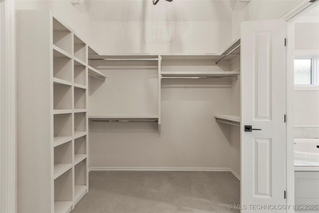 5913 E 127th St S, Tulsa, OK 74008 - spacious closet featuring carpet flooring