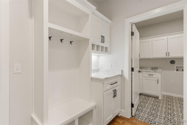 5913 E 127th St S, Tulsa, OK 74008 - mudroom featuring baseboards