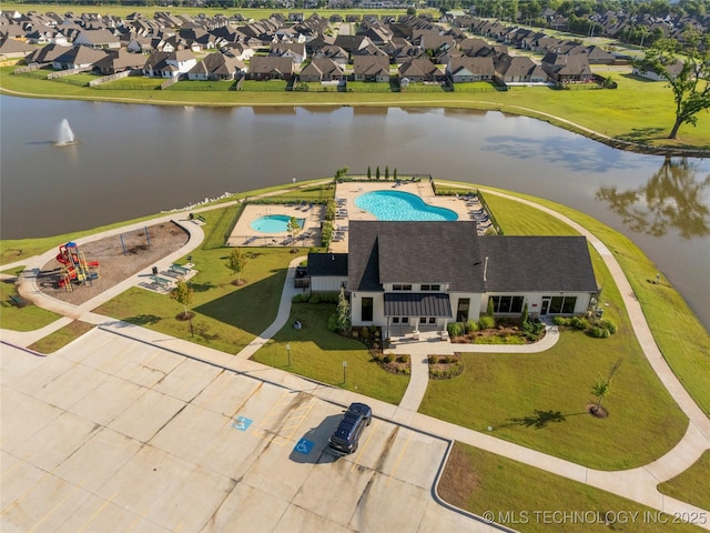 5913 E 127th St S, Tulsa, OK 74008 - bird's eye view of a pool and a nearby body of water