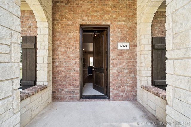 27920 160th St, Coweta, OK 74429 - doorway to property featuring brick siding