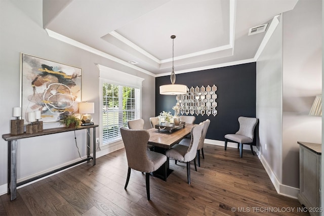 27920 160th St, Coweta, OK 74429 - dining room with a tray ceiling, dark wood-style floors, and ornamental molding