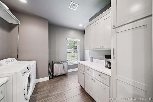 27920 160th St, Coweta, OK 74429 - laundry room with cabinet space, independent washer and dryer, recessed lighting, and wood finished floors
