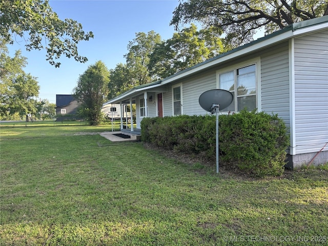 18969 County Road 3560, Ada, OK 74820 - view of side of home featuring a lawn